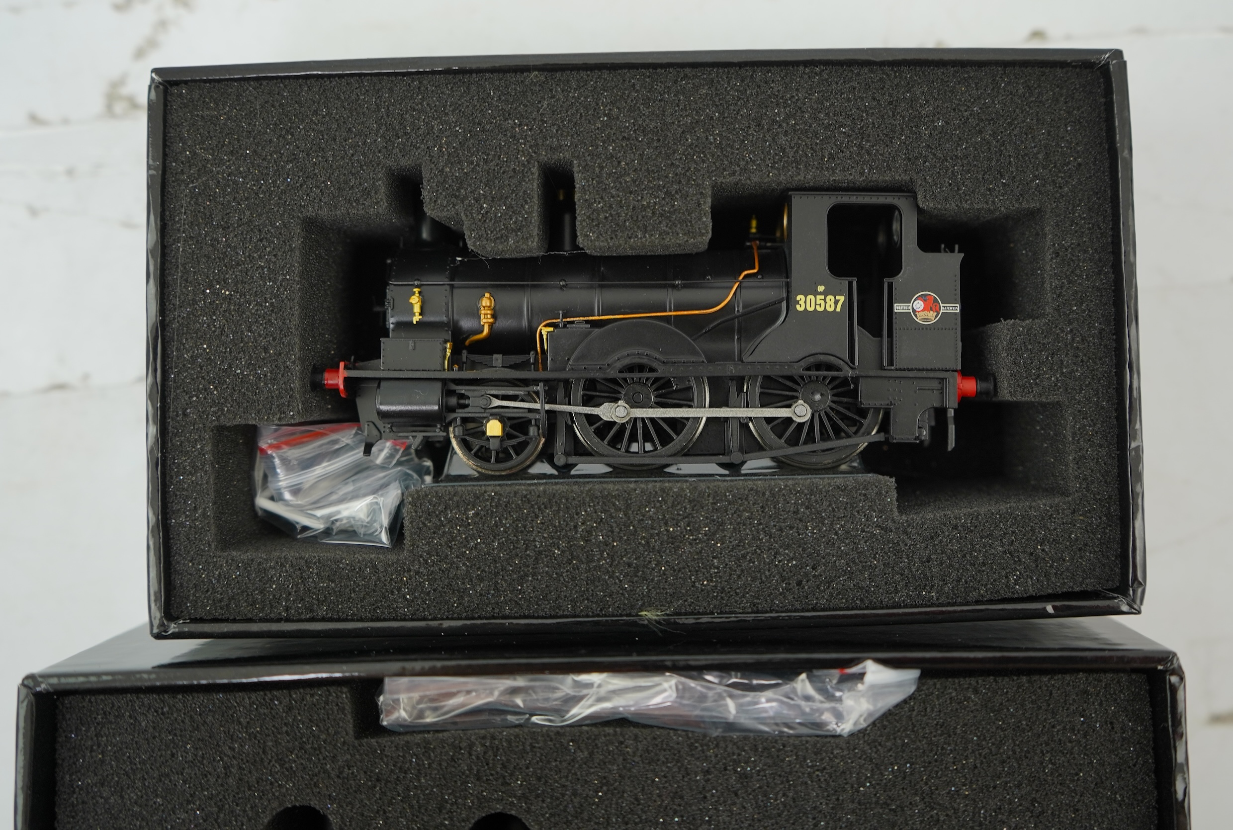 Two boxed Kernow Model Rail Centre 00 gauge railway tank locomotives; a Southern Railway Adams Class O2, 225, (K2105), together with a BR Beattie Well Tank, 30587, (K2056)